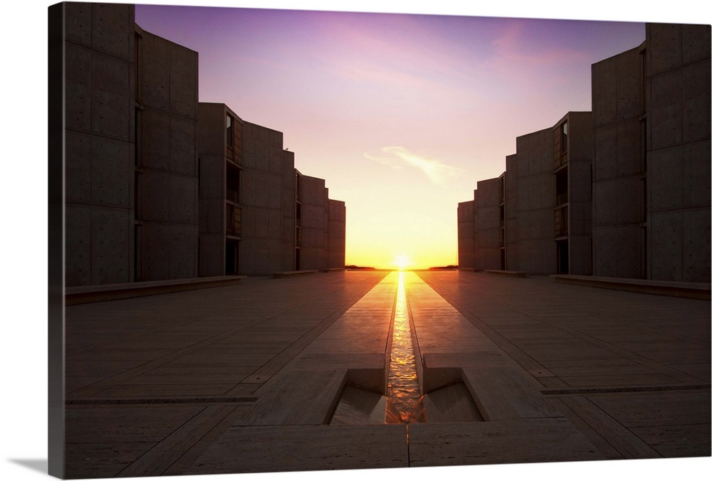 View of Equinox with sun sets perfectly in line with waterway at Salk.