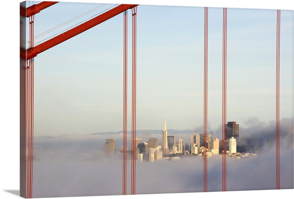 San Francisco in fog through Golden Gate Bridge.