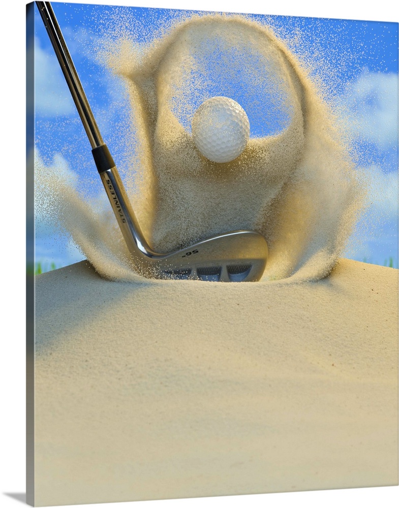Sand wedge hitting a golf ball out of a sand trap