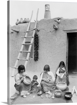 Santa Clara Pueblo Indian women making pottery, New Mexico, 1938