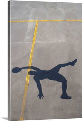 Shadow of basketball player jumping
