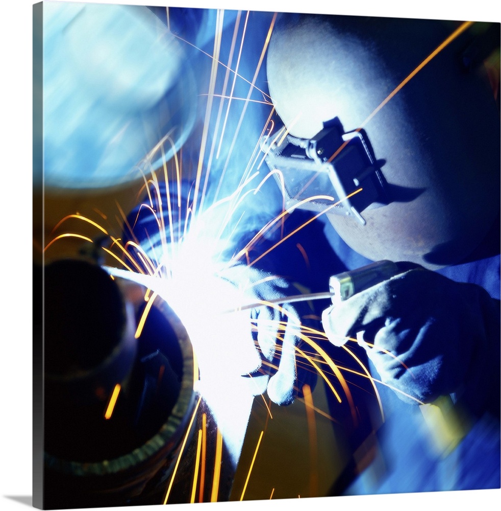 Shot of a welder welding