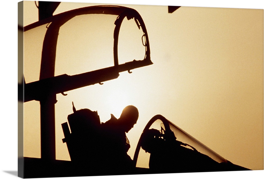 Silhouette pilot in military aircraft