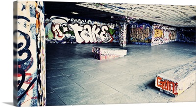 Skate park with graffiti on the walls