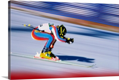 Skiing, downhill skier in action (blurred motion)