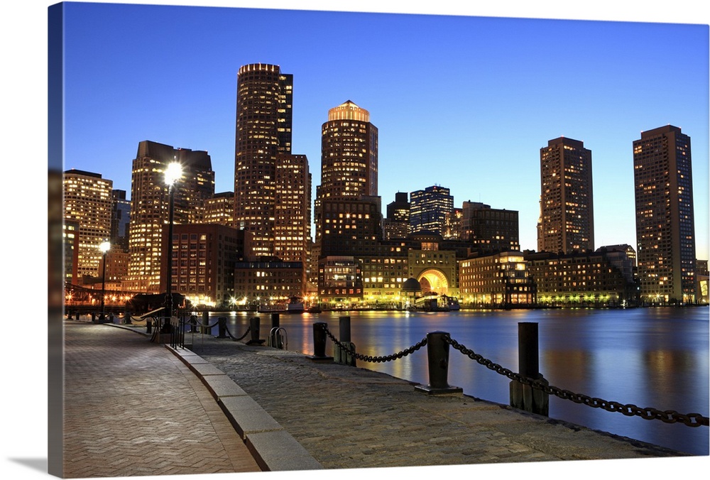 Boston Harbor and skyline.  Boston is one of the oldest cities in the United States and largest city in new England.  It h...