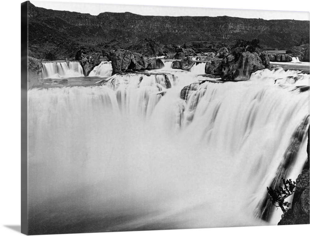 The Snake River rushes over the 212 foot drop that comprises Shoshone Falls. The falls are higher than Niagara's and attra...