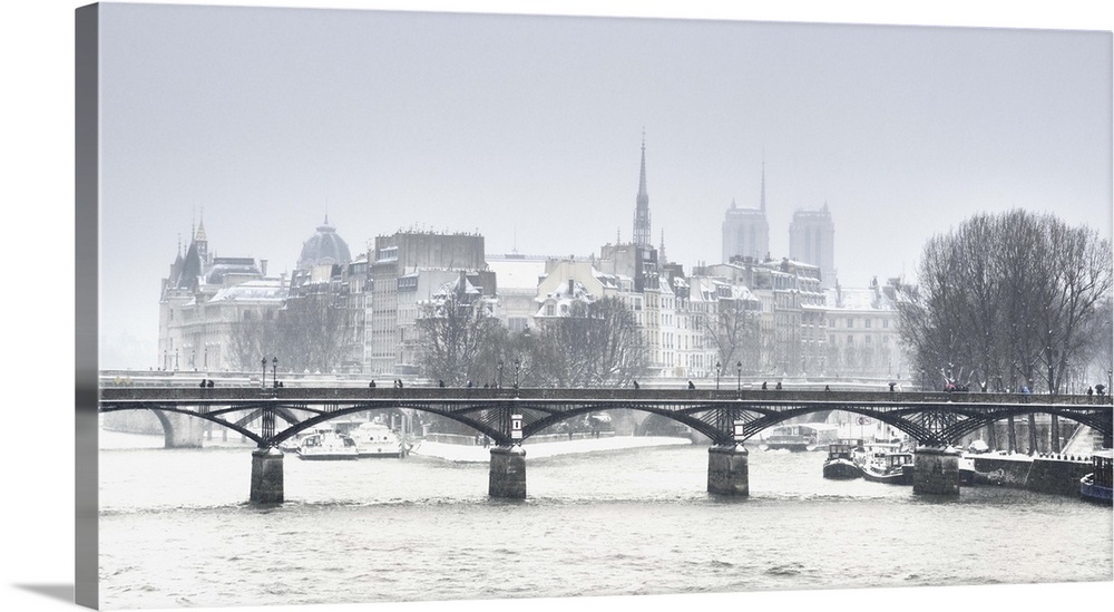 Snow covered bridge in Paris