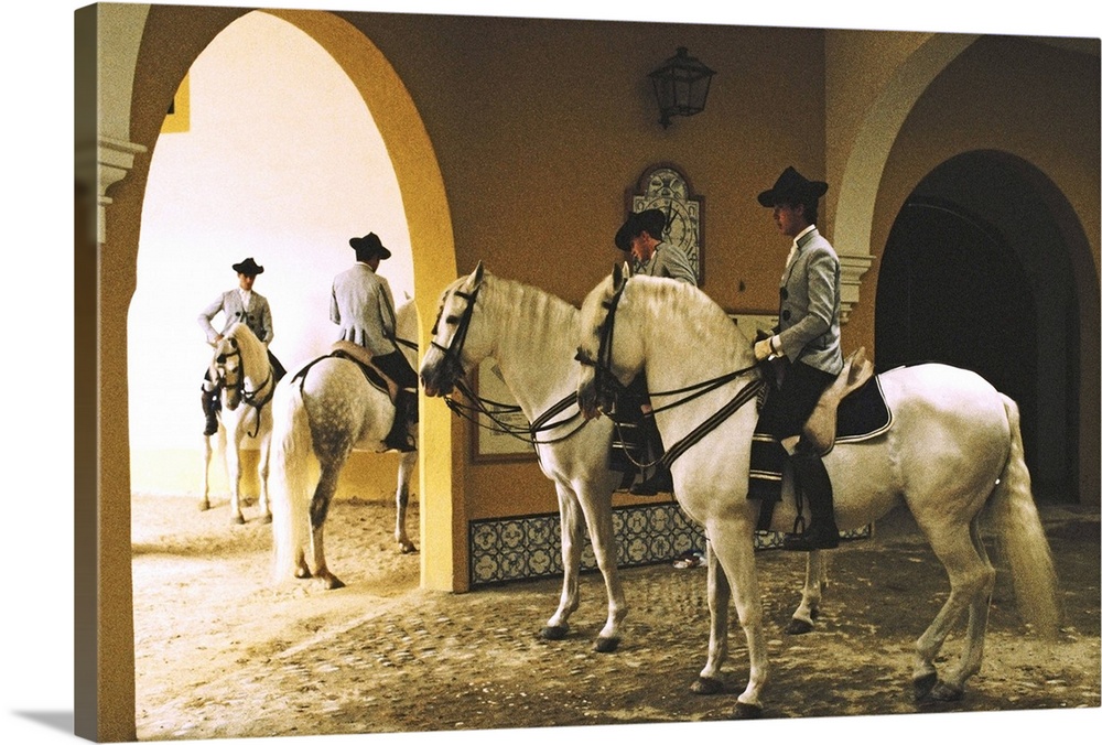 Spain,Jerez de la Frontera,School of Equestrian Art,four men on horses