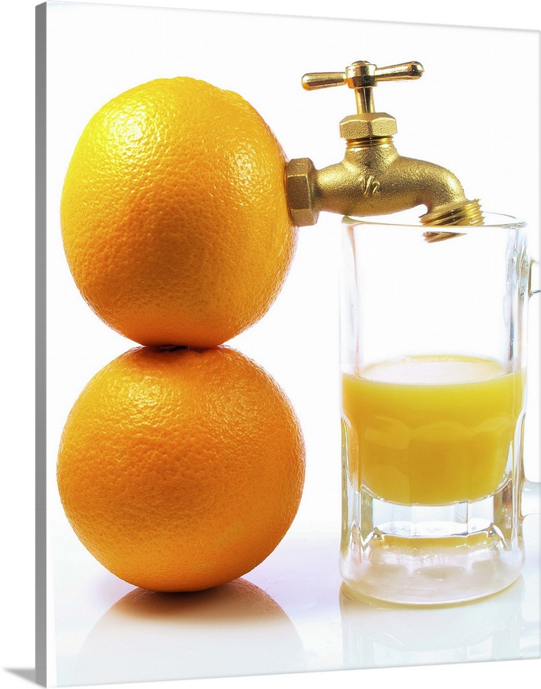 Two oranges with spigot attached next to glass of orange juice on white background.