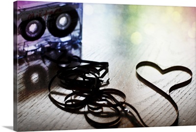 Spilled cassette tape symbolizing the love of old school mix tapes and all things analog