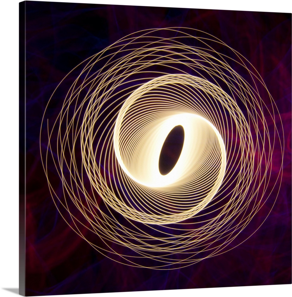 Physiogram / Spiralling light painting with red and blue smokey background.lightpainting single exposure