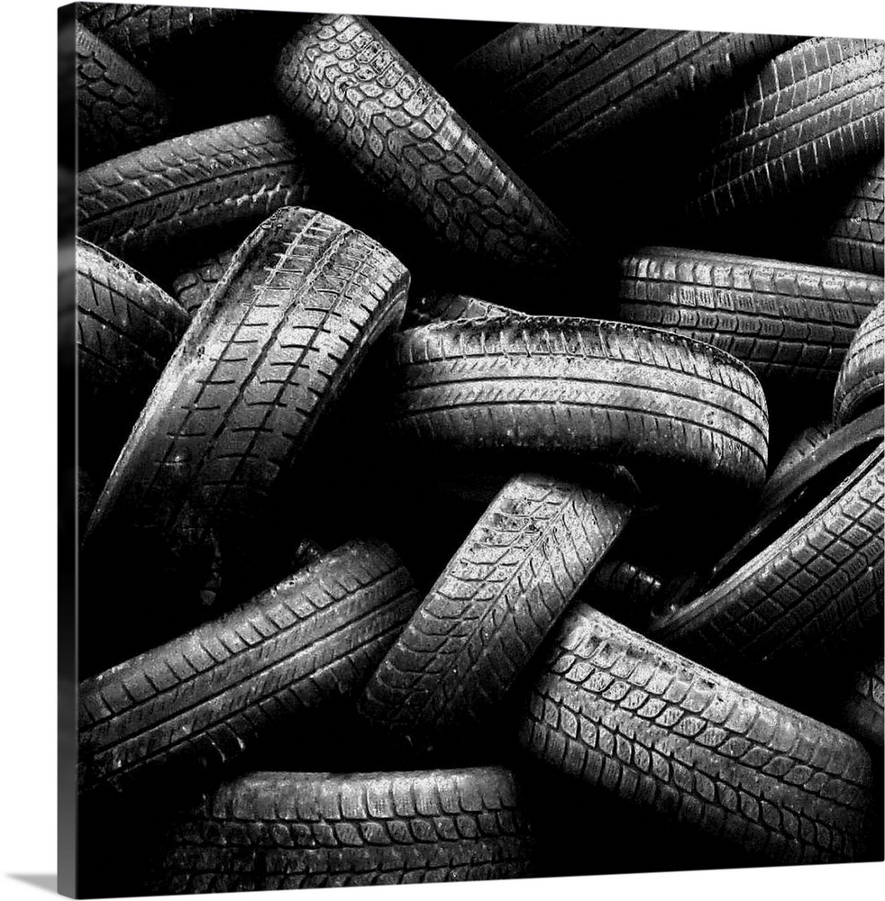Tires stacks of black and white, lots of tires.