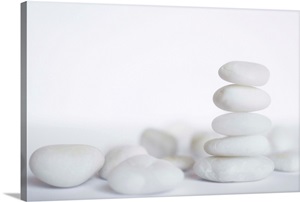 Stack of white pebbles on white background. image thumbnail