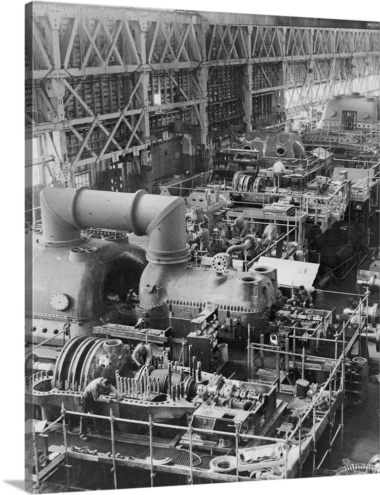 With a power potential of 581,500 kilowatts, seven steam turbines in various states of assembly are seen ready for testing...