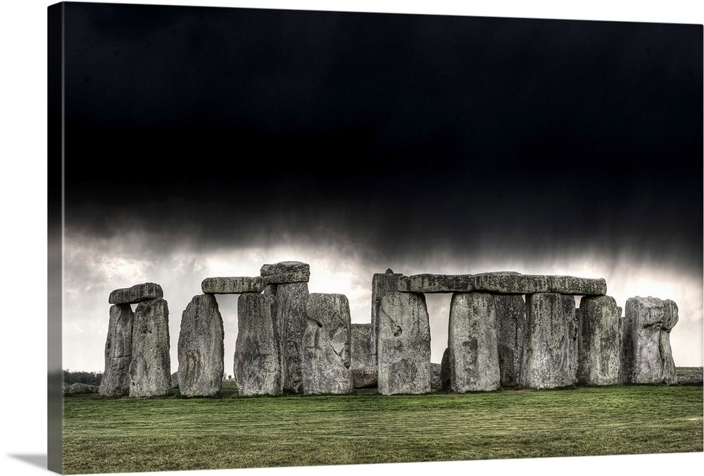 Most famous sites in world, Stonehenge is composed of earthworks surrounding  circular setting of large standing stones be...
