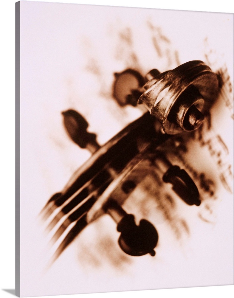 Stradivarius violin scroll on sheet music (vignette, toned B&W)