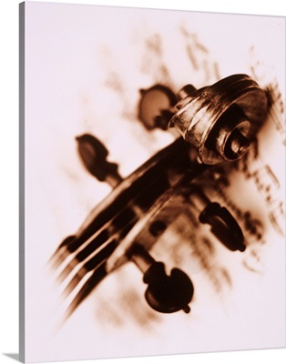 Stradivarius violin scroll on sheet music