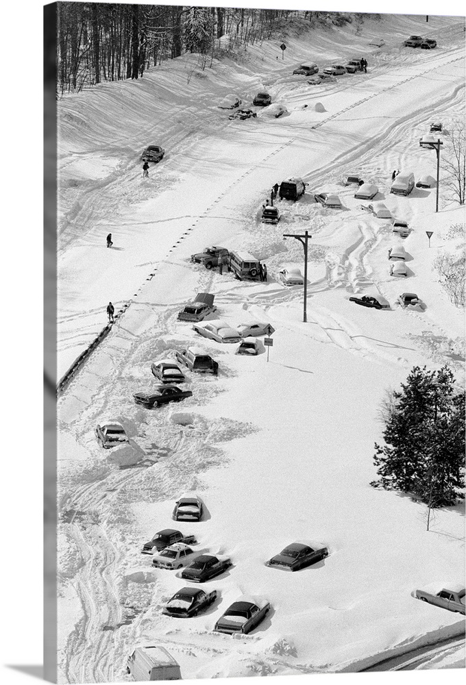 New York: Motorist try to dig out from the blizzard of '83 on the Grand Central Parkway in Queens 2/12. Police patrolling ...