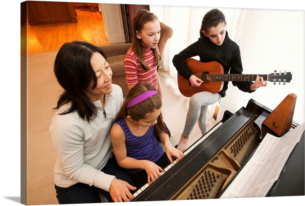 Students and teacher playing instruments