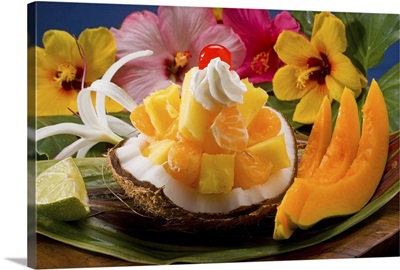 Studio shot of a tropical fruit salad with flowers
