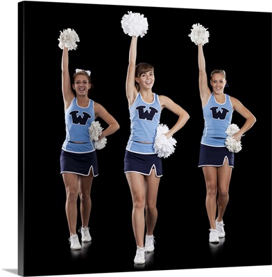 Studio shot of cheerleaders dancing