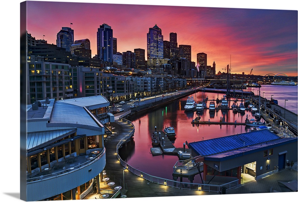 Big canvas photo art of downtown Seattle meeting a harbor with a vibrant sunset in the distance.