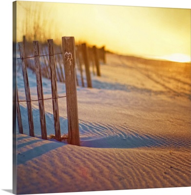 Sunrise beach fence with carved heart