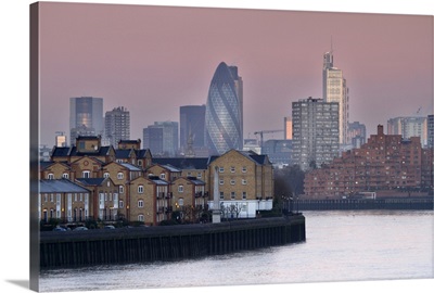 Sunrise on River Thames towards City of London from Canary Wharf and Docklands.