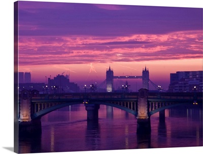 Sunrise over the Thames and Tower Bridge in London.