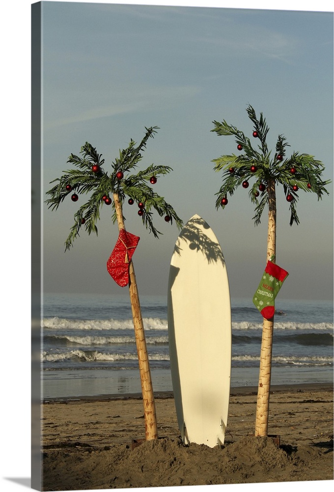 https://static.greatbigcanvas.com/images/singlecanvas_thick_none/getty-images/surfboard-and-palm-trees-at-christmas,1928177.jpg