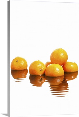 Sweet melons with reflection on rippling water surface