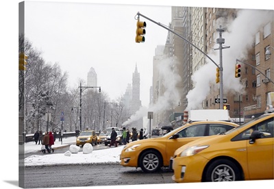 Taxi cabs on New York City street during winter