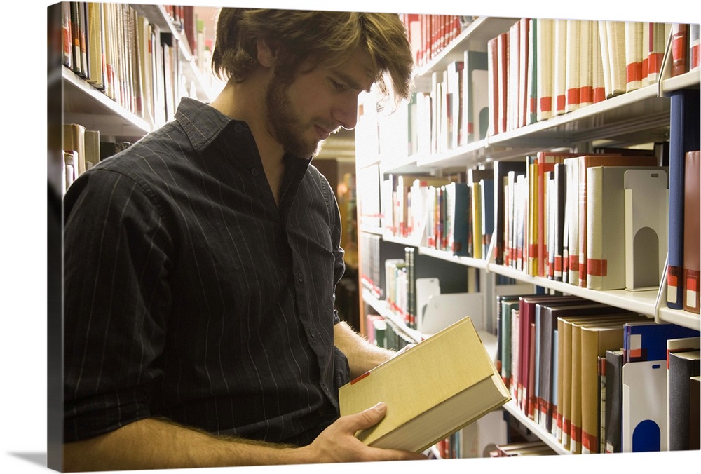 Teenage student in library