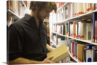 Teenage student in library