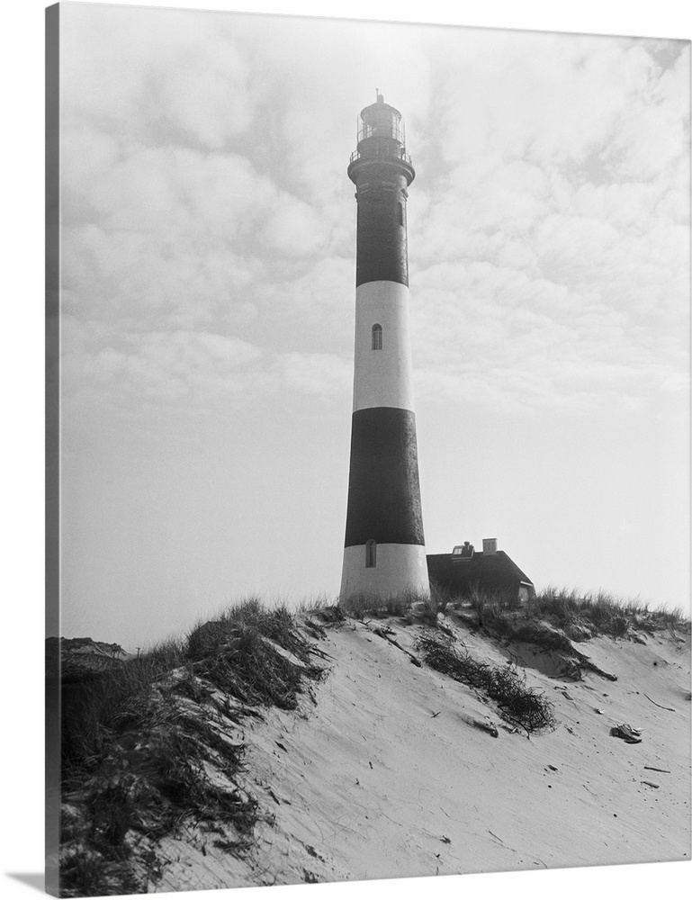 On a lonely site on the Atlantic shore of Fire Island, stands the Fire Island Lighthouse, the guidepost to incoming ocean ...