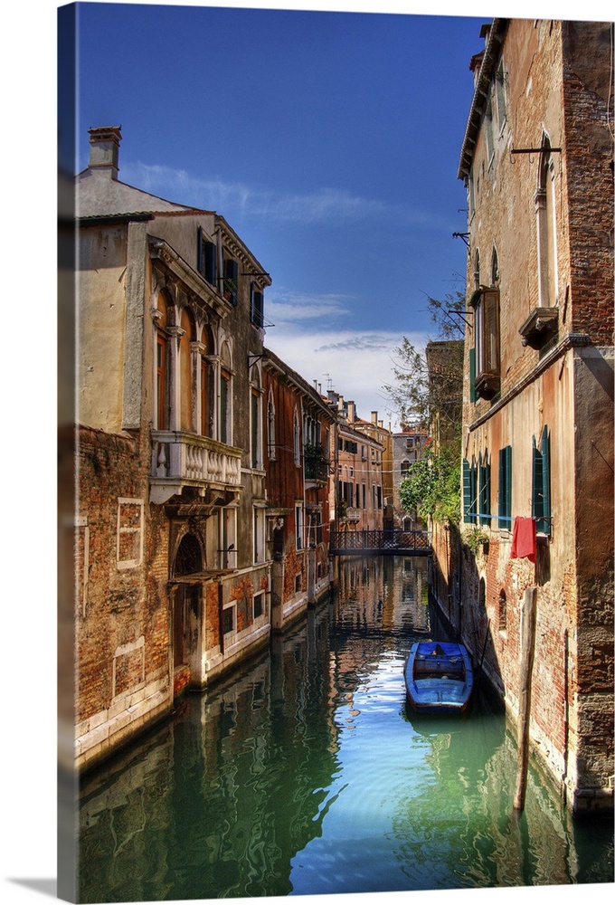 Boat in a small canal in Venice