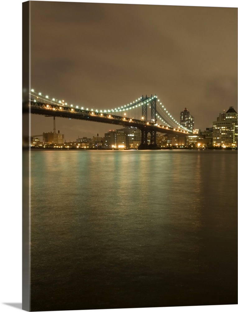 The Manhattan Bridge, the DUMBO neighborhood of Brooklyn and the East River at Night, Viewed from the East River Esplanade...