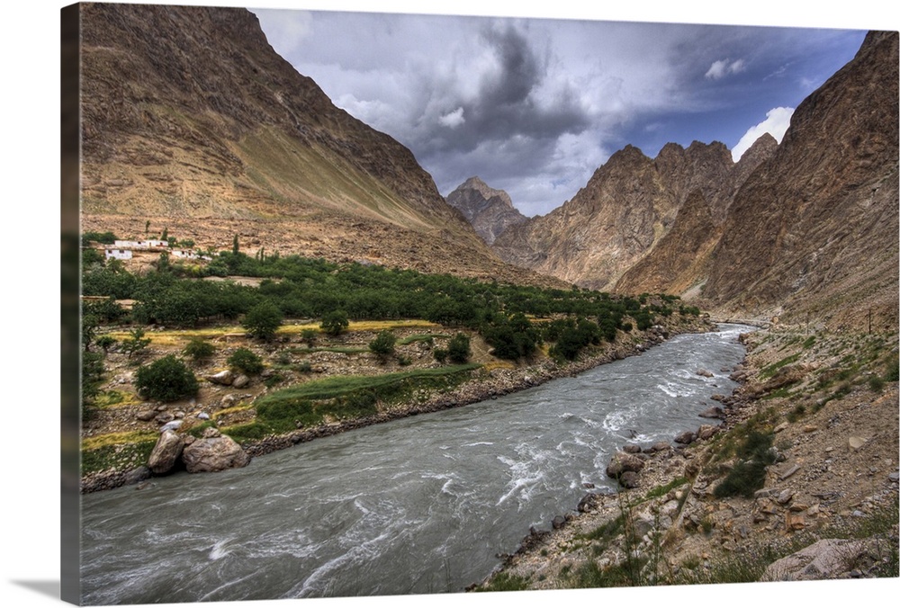 Shot on the road between Khorog and Kalaikhum along the Pamir highway in Tajikistan. The river makes the border between Ta...