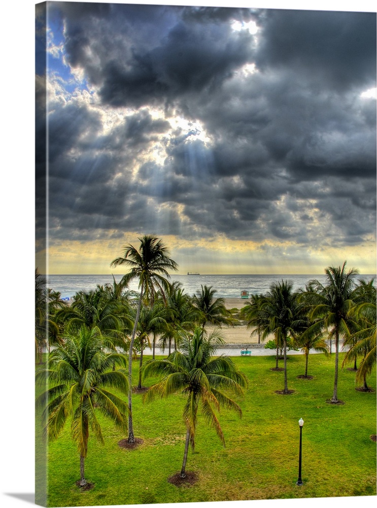 Miami beach with cloudy sky in background.