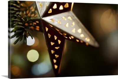 Tin Christmas light on tree
