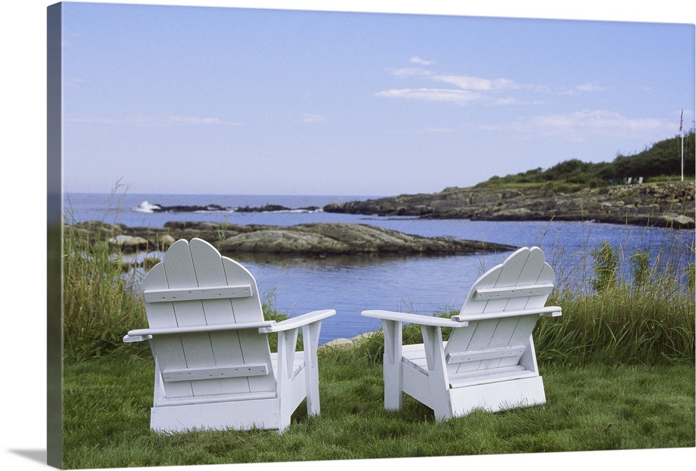 Two adirondack chairs overlooking ocean, york
