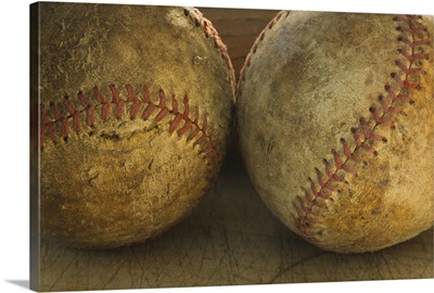 Two antique baseballs