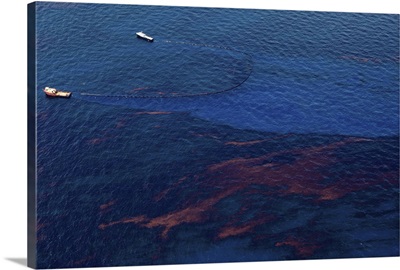 Two Boats Skim Oil off the Surface of the Gulf