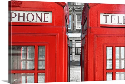 Two London telephone boxes side by side.