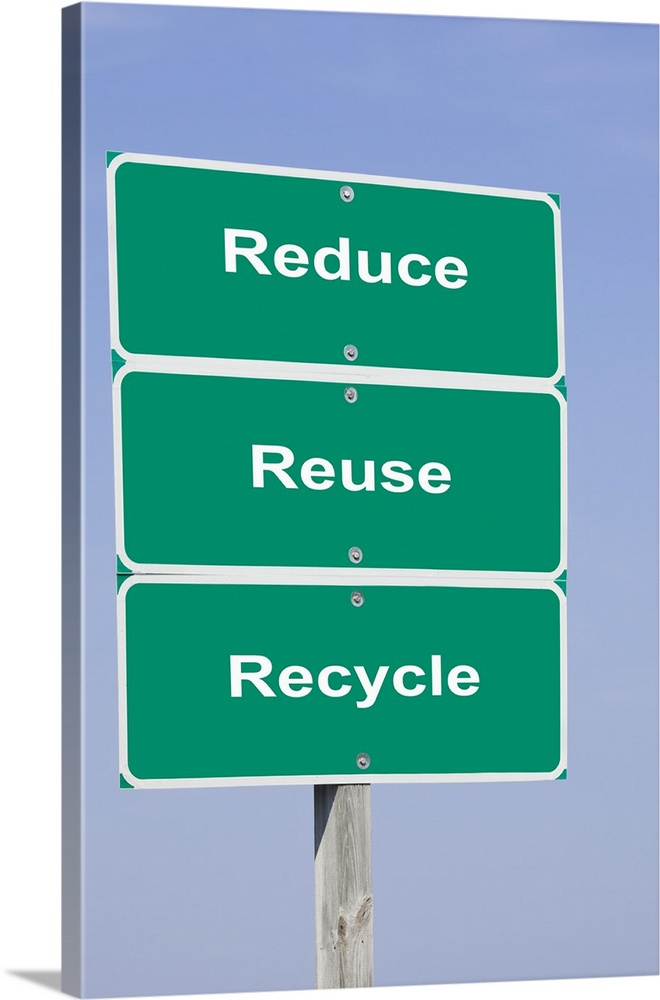 USA, Illinois, Metamora, Road signs reading REDUCE REUSE RECYCLE