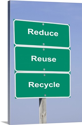 USA, Illinois, Metamora, Road signs reading REDUCE REUSE RECYCLE