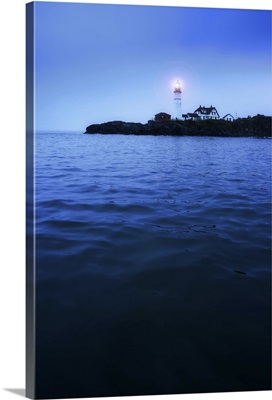 USA, Maine, Portland, Remote coastline with lighthouse