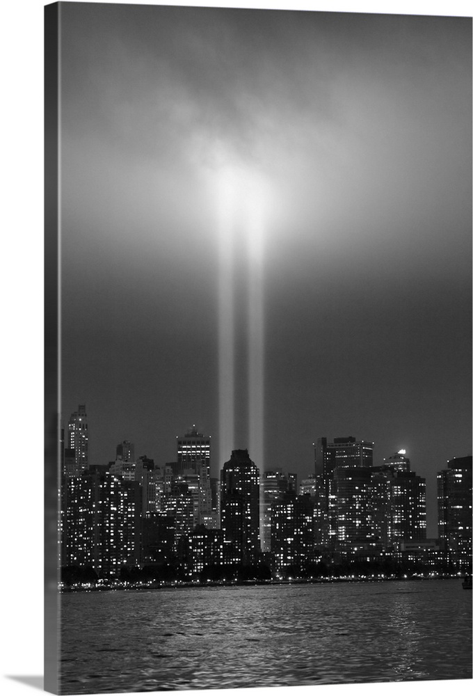 USA, New York City, Manhattan skyline with 9/11 memorial lights