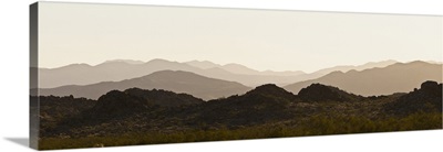 USA, Southern California Desert, Several mountain ranges backlit by morning sun